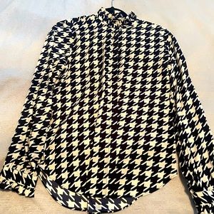 Beautiful button-up checkered blouse. Ruffled collars and arm.